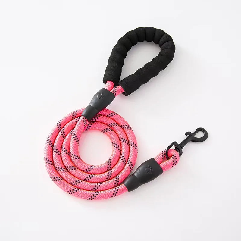 A reflective pet dog leash with a comfortable soft-padded handle - a leash for pet dogs - enhances safety and control